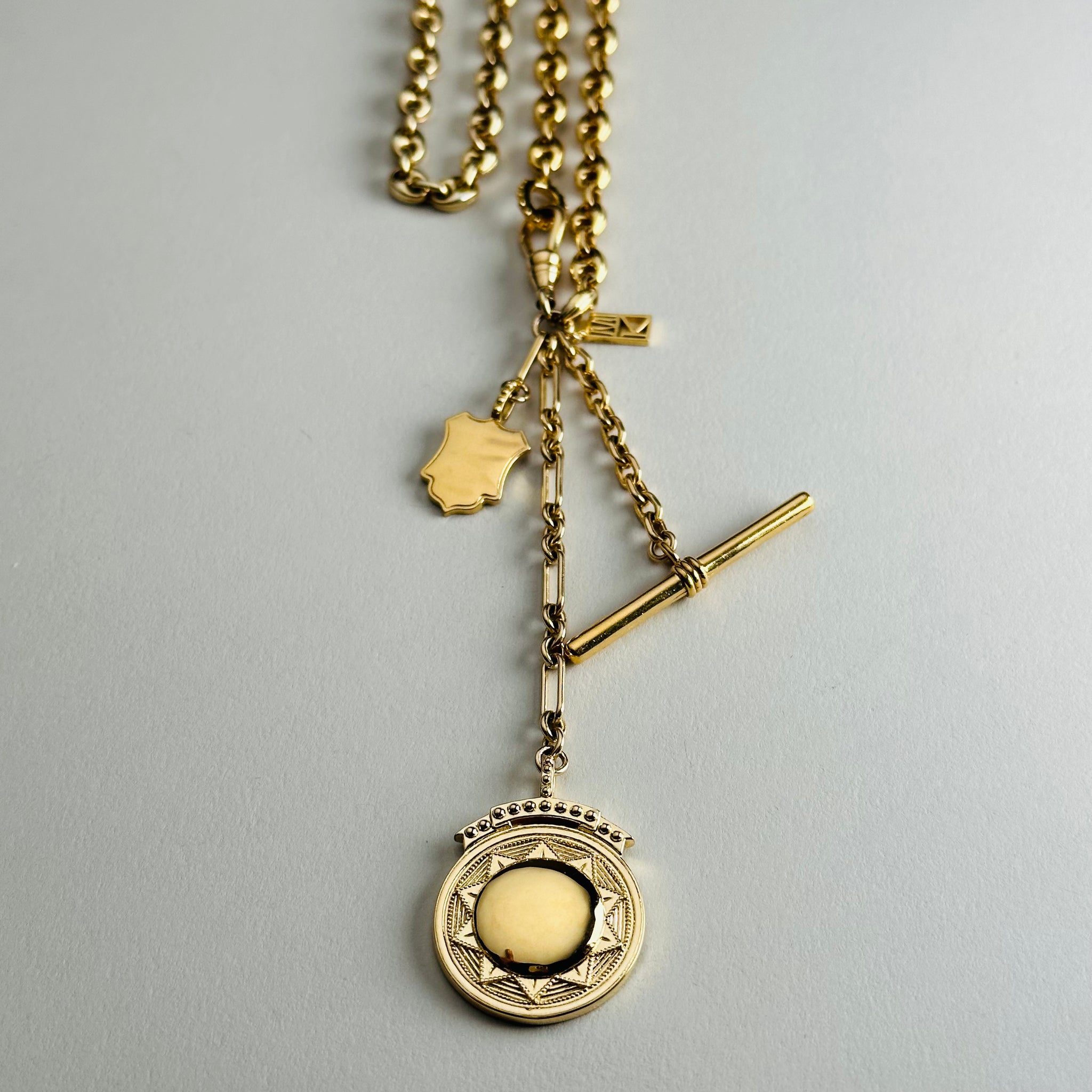 Load image into Gallery viewer, Puffy Mariner Sundial + Shield Fob Necklace