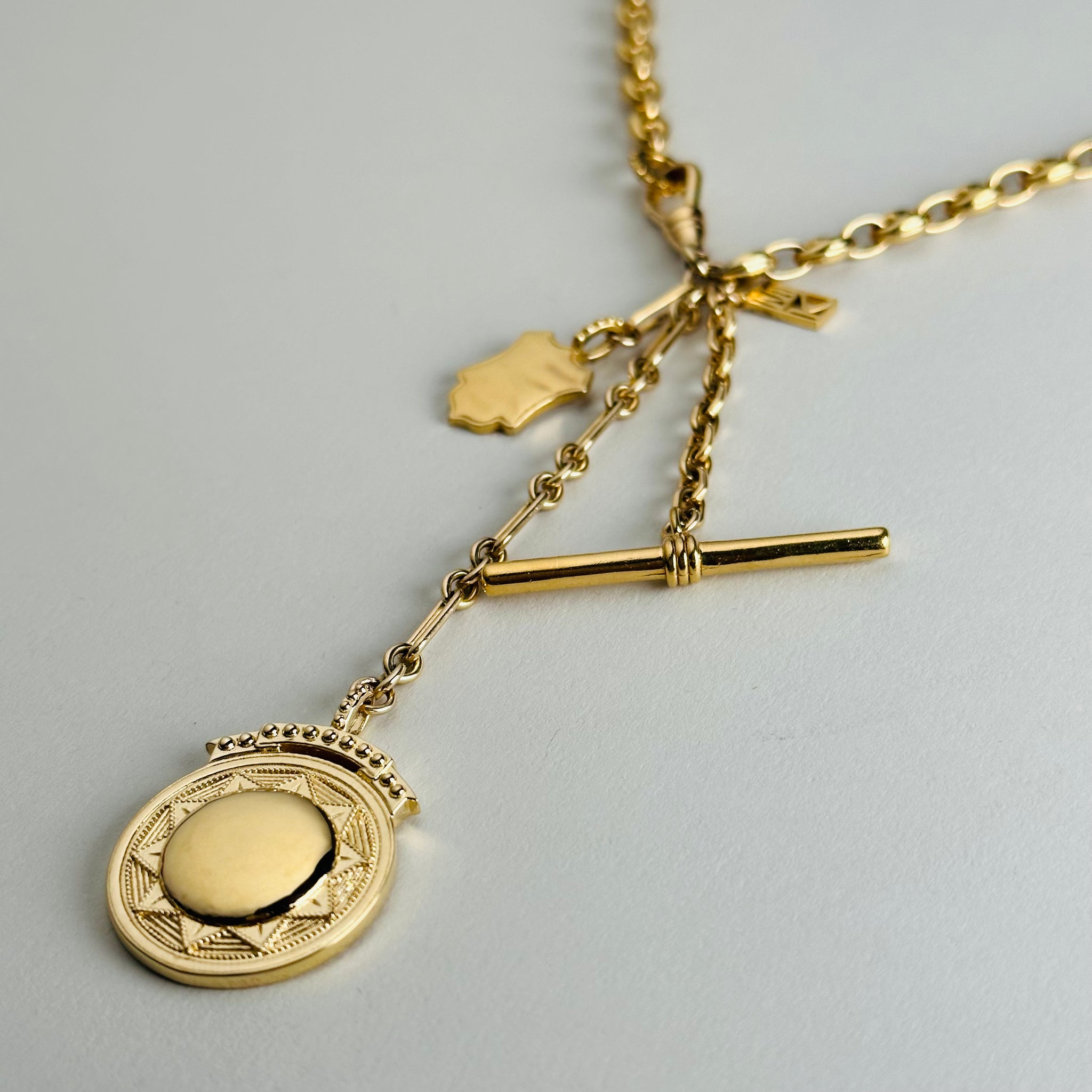 Load image into Gallery viewer, Puffy Mariner Sundial + Shield Fob Necklace