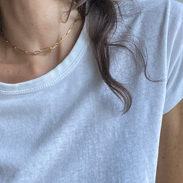 Load image into Gallery viewer, Girl wearing Vintage White T Shirt with Gold Hook and Loop Necklace Leilou Chain