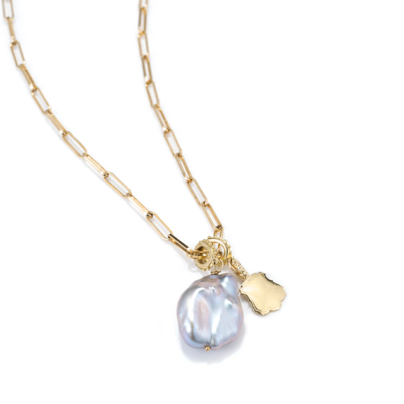 Load image into Gallery viewer, silver large baroque pearl with shiny brass sheild charm on gold filled chain
