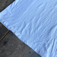 Load image into Gallery viewer, Vintage White T on wooden table
