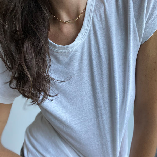 Girl wearing Vintage White T Shirt with Gold Hook and Loop Necklace Leilou Chain
