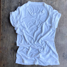 Load image into Gallery viewer, White T shirt on wooden table
